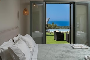 Deluxe Studio, Sea View | Premium bedding, down comforters, in-room safe, blackout drapes