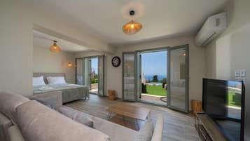 Monolocale Deluxe, vista mare | Area soggiorno | Stampante
