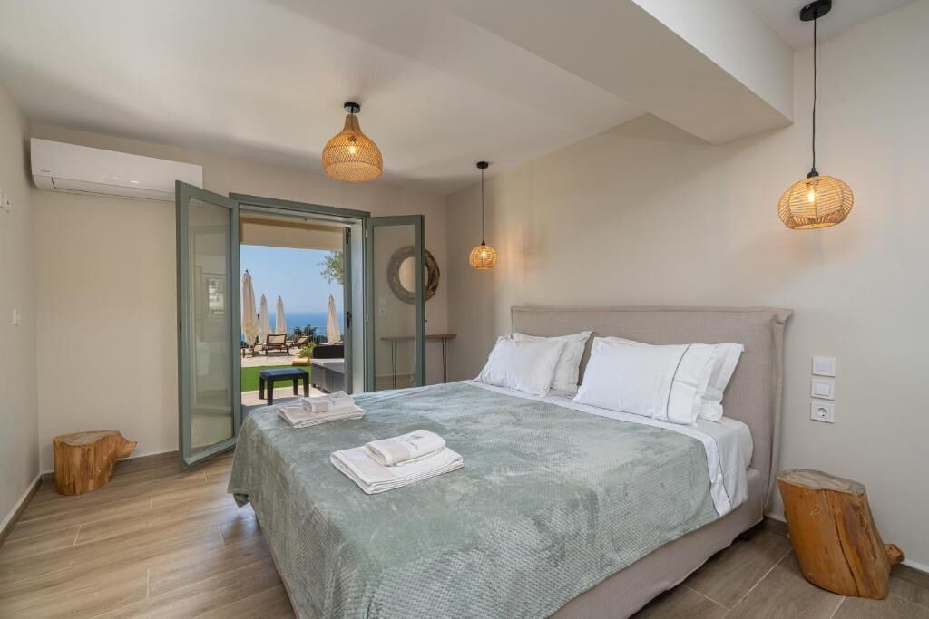 Suite Deluxe, vista al mar | Ropa de cama de alta calidad y edredón 