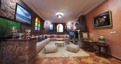 Authentic Berber mountain stay with panoramic Atlas views and Moroccan food.