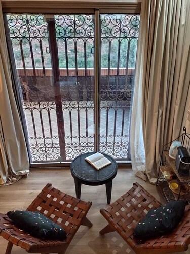 Authentic Berber mountain stay with panoramic Atlas views and Moroccan food.