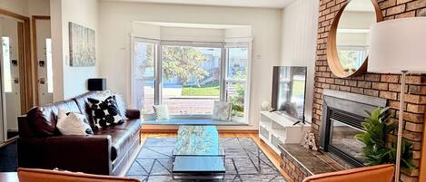 Smart TV, fireplace, table football, books