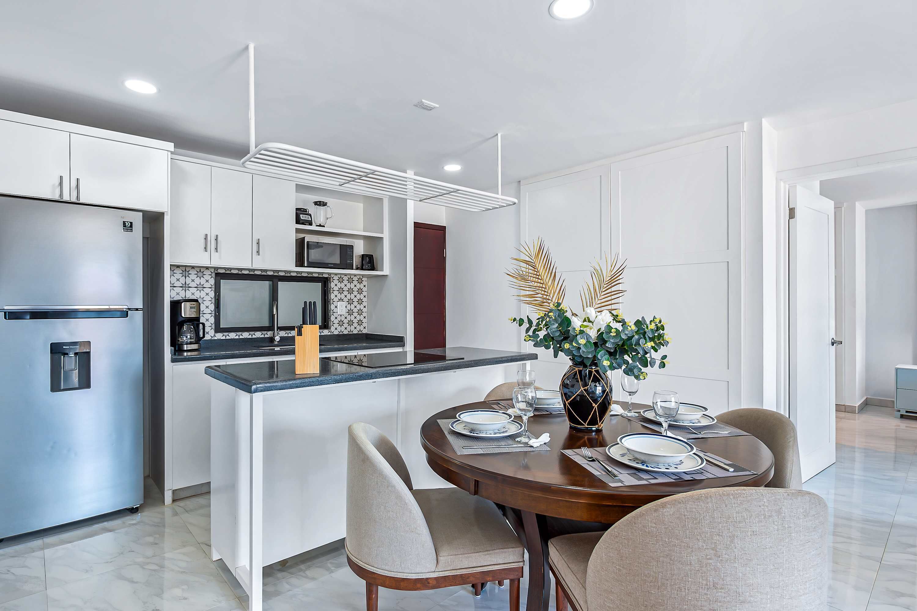 Fridge, microwave, stovetop, coffee/tea maker