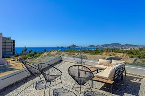 Terrace/patio - Stunning Oceanfront Luxury Apartment with spacious balcony– Perfect for Families (Cabo San Lucas)