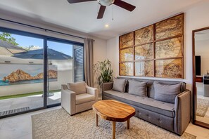 TV, offices - Family-Friendly oasis with pool and steps from Medano Beach (Cabo San Lucas)