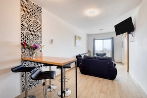 TV - Ocean view condo with scenic balcony, well-equipped kitchen, internet, & W/D (Cabo San Lucas)