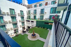 Terrace/patio - Hotel room with ocean-view rooftop infinity pool, AC, & gym - dog-friendly (Cabo San Lucas)