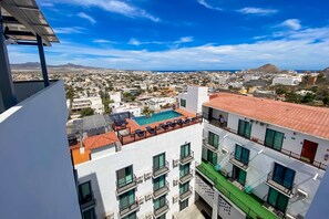 Property grounds - Hotel room with ocean-view rooftop infinity pool, AC, & gym - dog-friendly (Cabo San Lucas)
