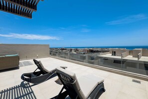 Terrace/patio - Luxury Cabo condo with multiple pools, pickleball, gym & rooftop (Cabo San Lucas)
