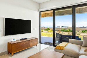 TV - Modern apartment with. ocean view, pool, patio, tennis, & gym (Cabo San Lucas)