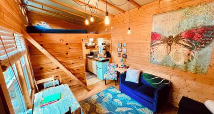Bamboo bungalow at Camp David. Pond-front, pet friendly tiny home retreat