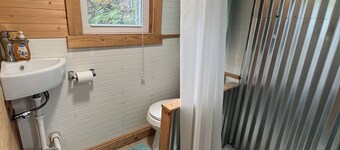 Bamboo bungalow at Camp David. Pond-front, pet friendly tiny home retreat