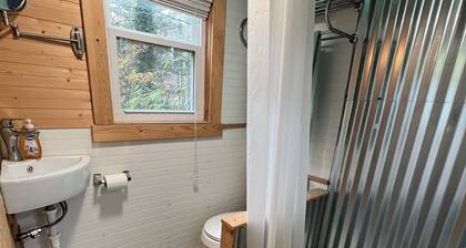 Bamboo bungalow at Camp David. Pond-front, pet friendly tiny home retreat