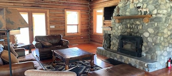 Beautiful Log Home with Fireplace and Deck on 160 acres. Pet friendly