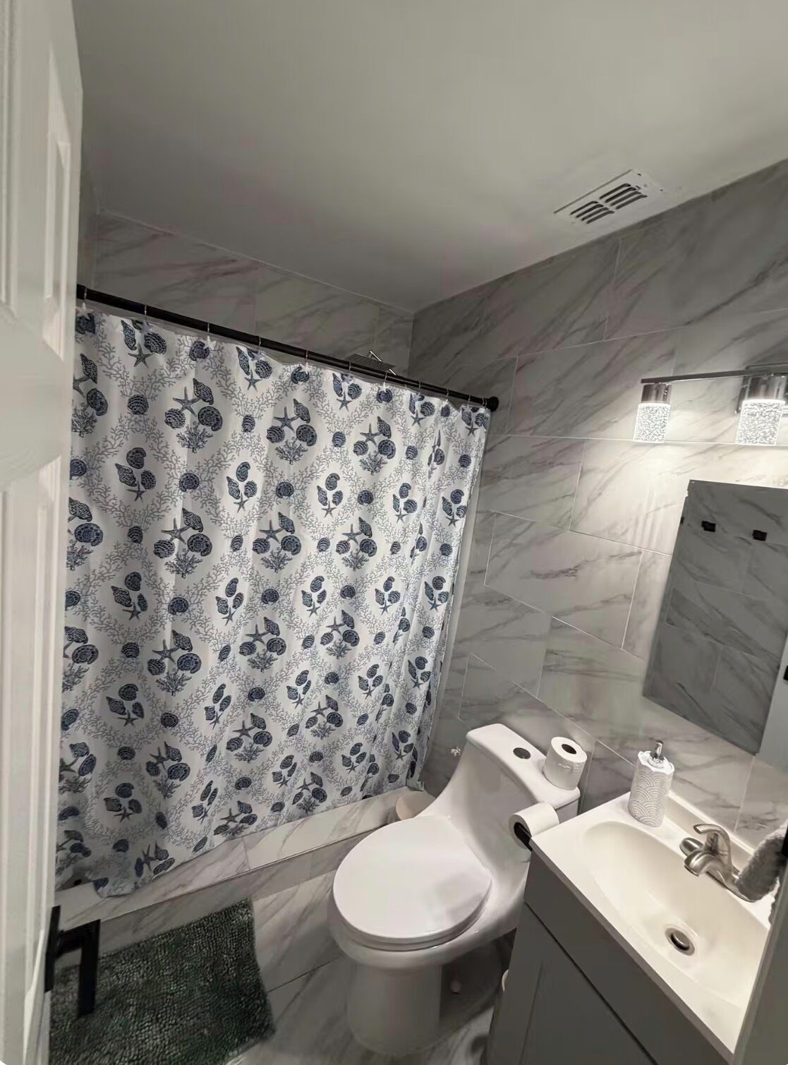 Hair dryer, towels, soap, toilet paper