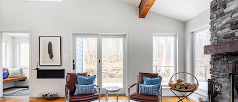 TV, fireplace, books, offices