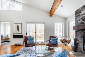 TV, fireplace, books, offices