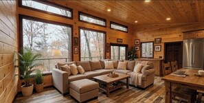 Living area - Secluded 2-bedroom cabin in the woods near Pomme De Terre lake. Private hot tub (Pittsburg)