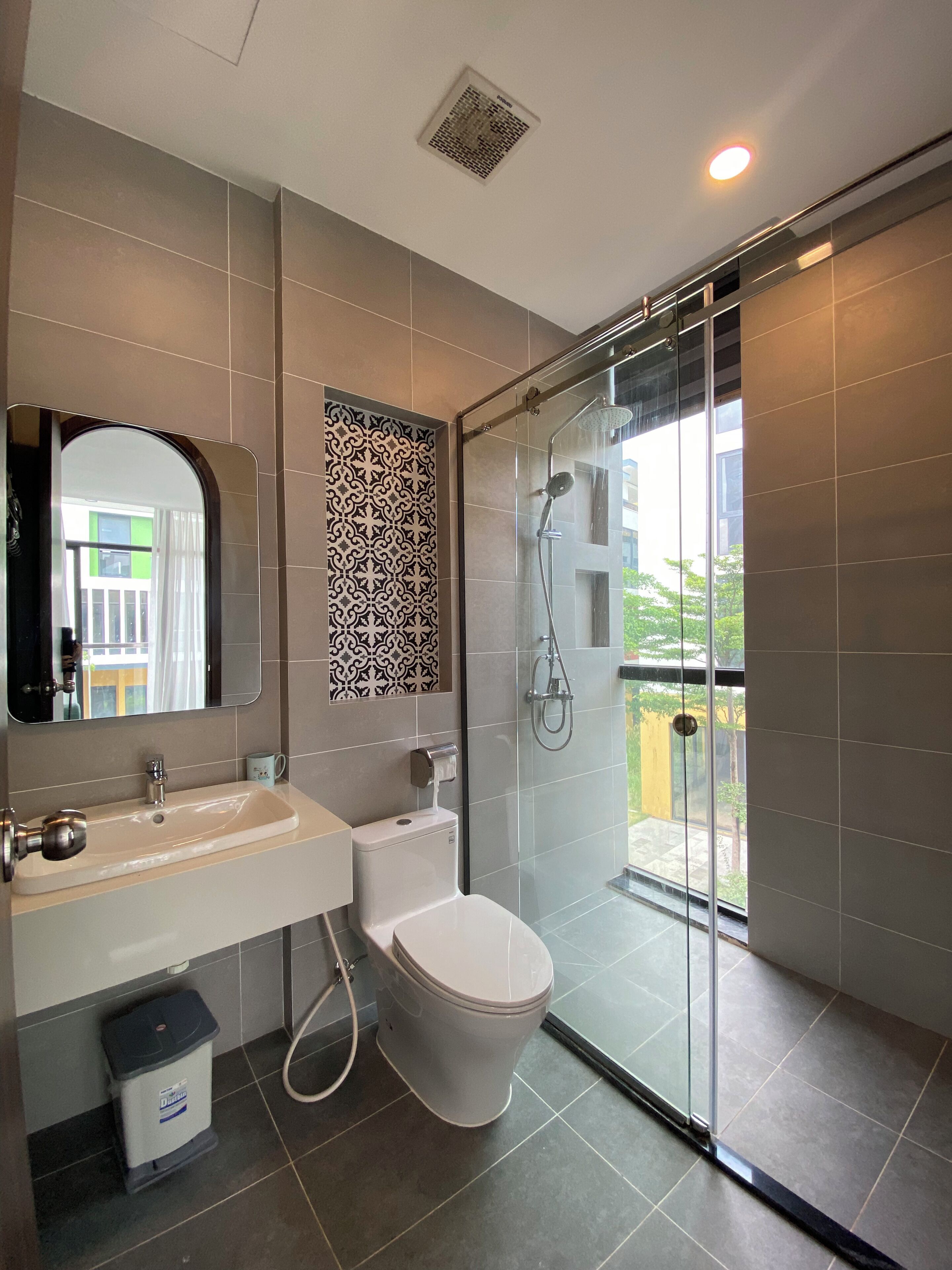 Shower, designer toiletries, hair dryer, towels