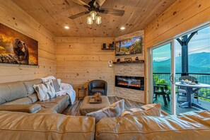 TV, fireplace - NEW-Panoramic Mountain Views-Luxury Gatlinburg cabin w/ theatre, hot tub & games (Gatlinburg)