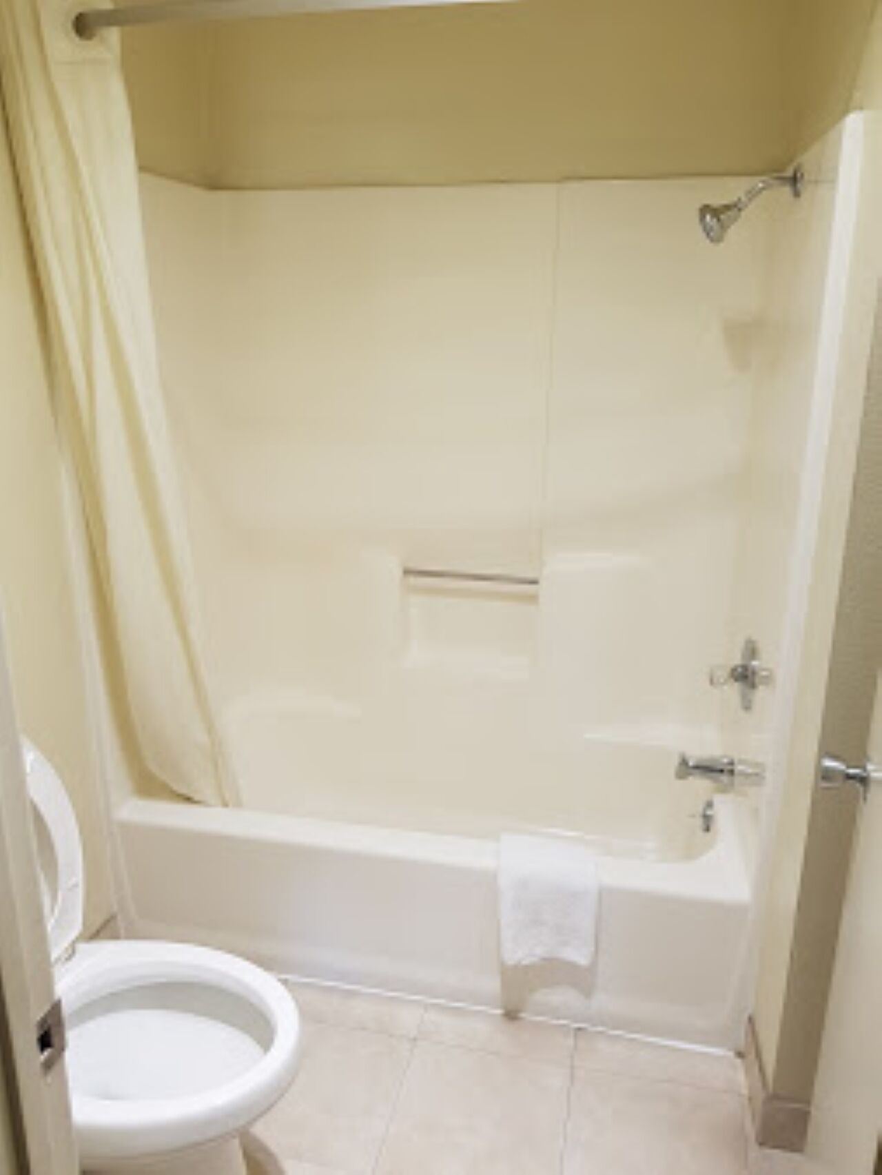 Combined shower/bathtub, hair dryer, towels, soap
