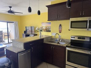 Coffee/tea maker, fridge, microwave, oven - Red Hook Retreat with Stunning Ocean Views (Red Hook)