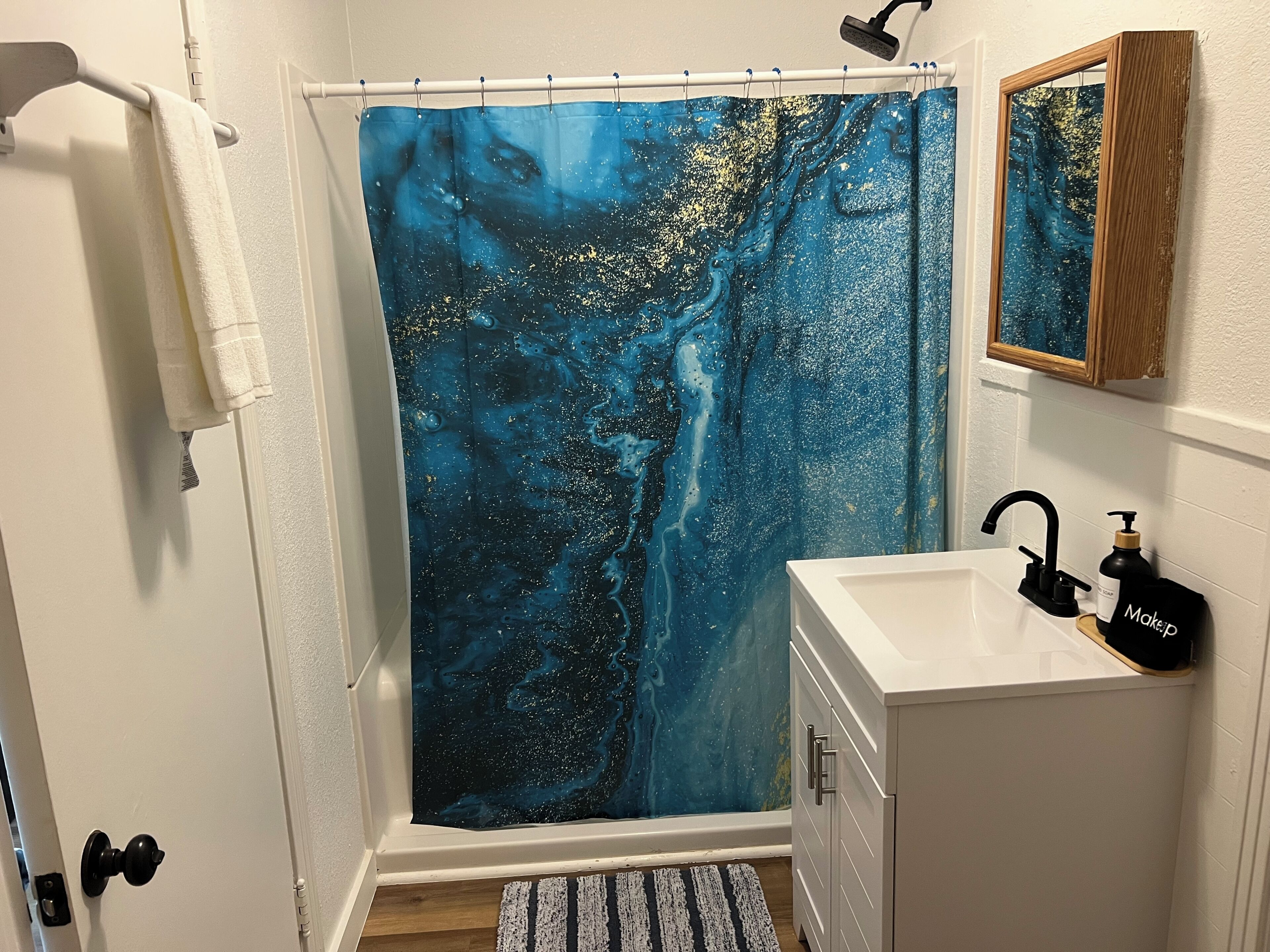 Shower, towels, soap, toilet paper
