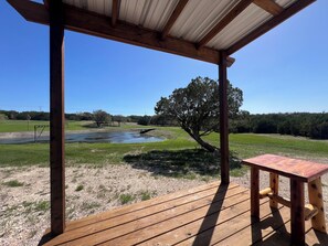 Property grounds - Cozy 1-bedroom cabin in enchanting Burnet with AC comfort (Burnet)