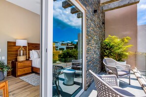 Terrace/patio - Ocean-view getaway with patio, grill, roof deck, & on-site pools (Cruz de Huanacaxtle)