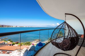 Terrace/patio - 3rd-floor beachfront condo with ocean views, balcony, outdoor pool, gym, & AC (Cruz de Huanacaxtle)