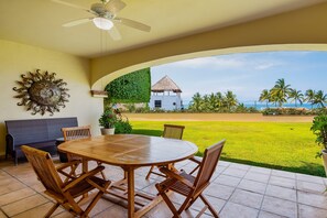 Outdoor dining - Stylish apartment near beach & dining with pool, hot tub, tennis, & large patio (Punta Mita)