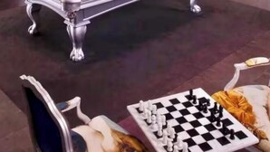 A billiards table with a pool cue and balls, a chessboard with pieces, and a classic armchair. - erfront 2BR Icon Brickell, 5-Star W Hotel Serenity Views - Wow! (Miami)