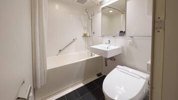 Combined shower/tub, hair dryer, slippers, towels