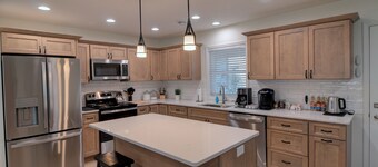 New 3-bed/ 2 bath home with Game Room, Screened Porch and Firepit.