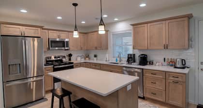 New 3-bed/ 2 bath home with Game Room, Screened Porch and Firepit.