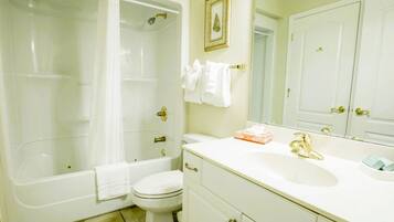 Shower, jetted tub, towels