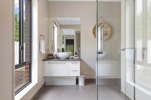 Shower, hair dryer, towels