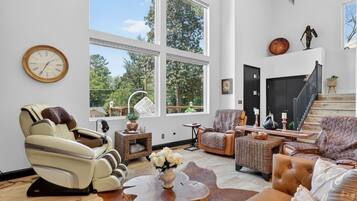 TV, fireplace, books, offices