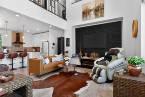 TV, fireplace, books, offices