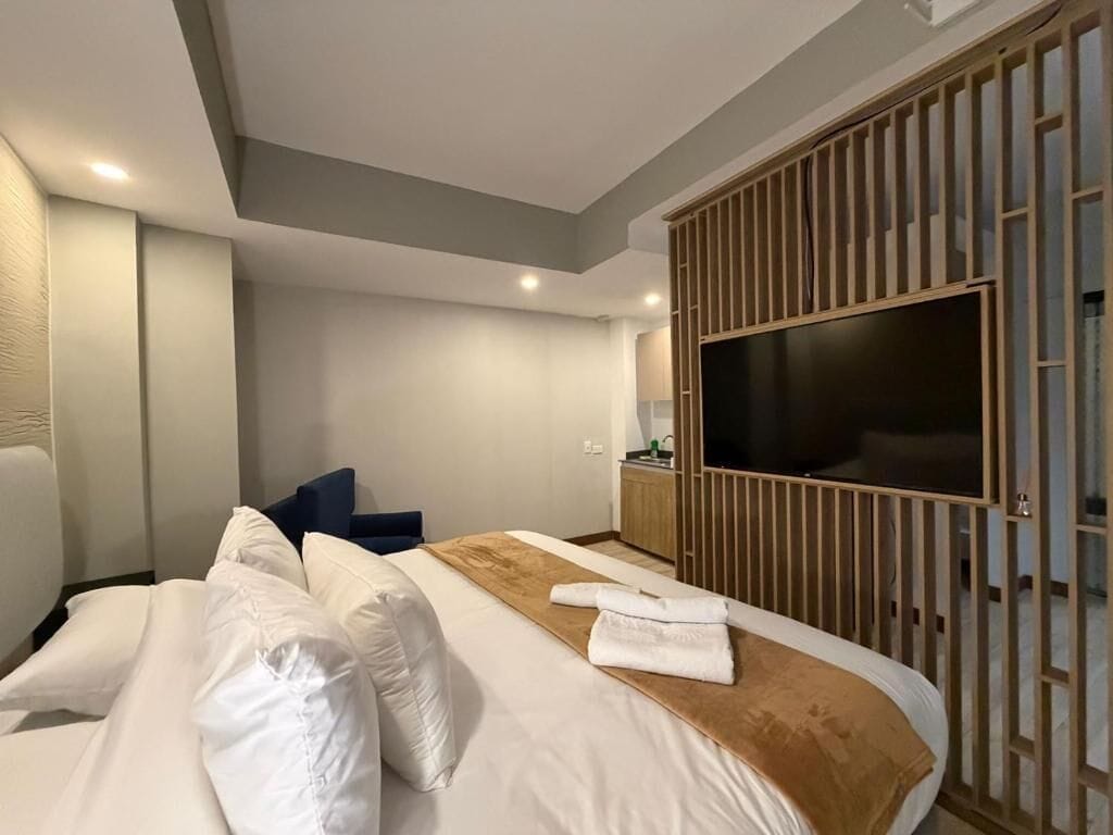 Habitación estándar, 1 cama King size | Edredón, caja de seguridad en la habitación y cortinas blackout 