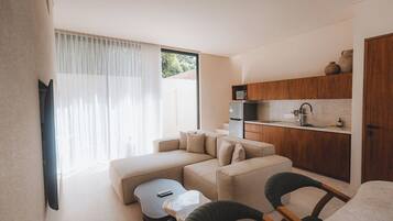 Deluxe Villa, Garden View | Living area