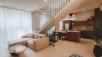 Familjevilla - utsikt mot trädgården | Vardagsrum