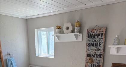 “Kozy on Kingsway” is a charming 4-bedroom house in Cape -The City of Roses