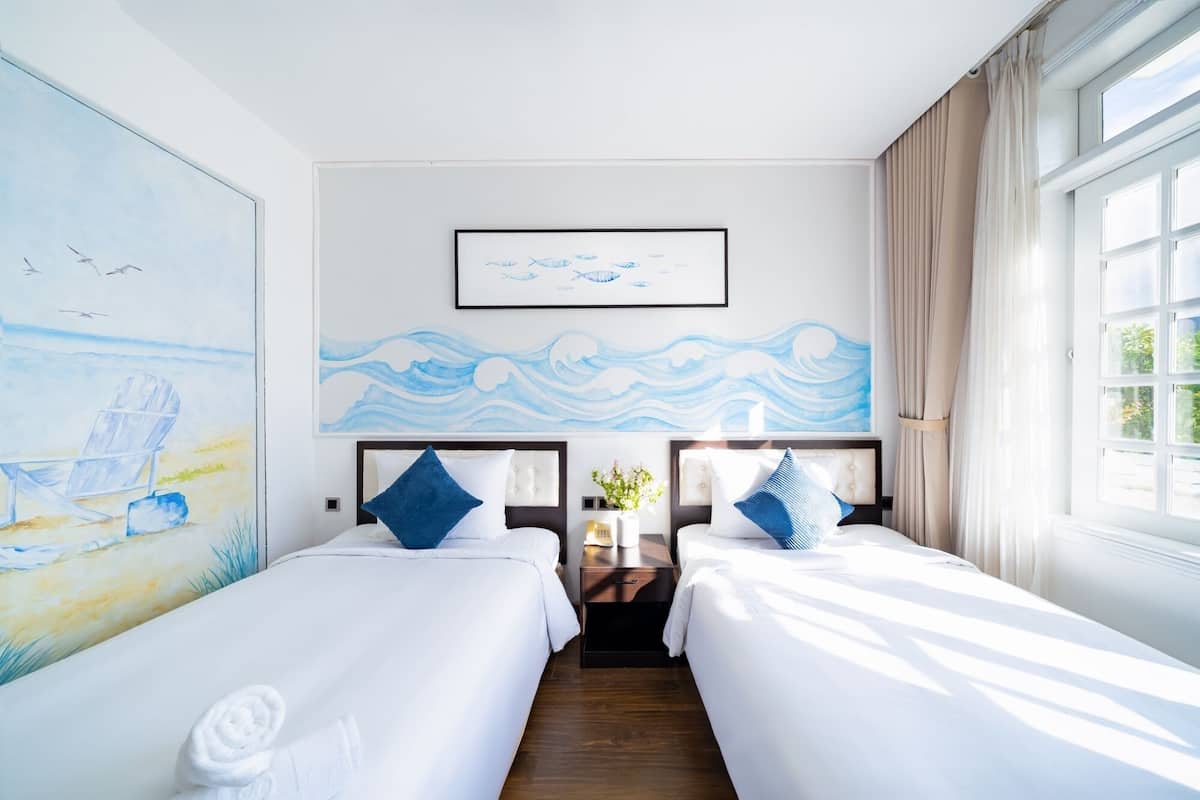 Chambre Standard avec lits jumeaux | Accès au Wi-Fi (inclus), literie fournie