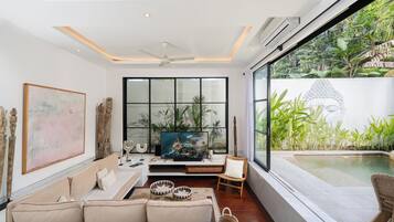 Villa Deluxe | Zona de estar | Una televisión de pantalla plana
