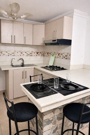 Private kitchen - Nova Suite : Modern and cozy in the center of Guayaquil (Guayaquil)