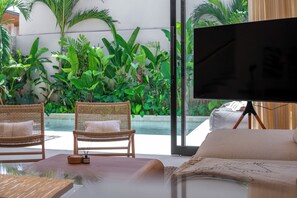 Luxury Villa, 2 Bedrooms, Private Pool, Garden View | Living area | 53-inch Smart TV with digital channels - La Brava  (Pecatu)