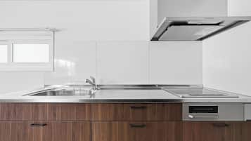 Apartment | Private kitchen | Fridge, microwave, stovetop, cookware/dishes/utensils