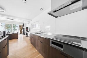 Appartement | Cuisine privée | Réfrigérateur, micro-ondes, plaque de cuisson