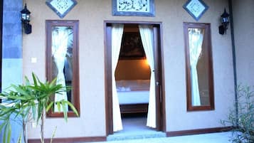 Kamar Double Standar, balkon, pemandangan halaman | Detail eksterior